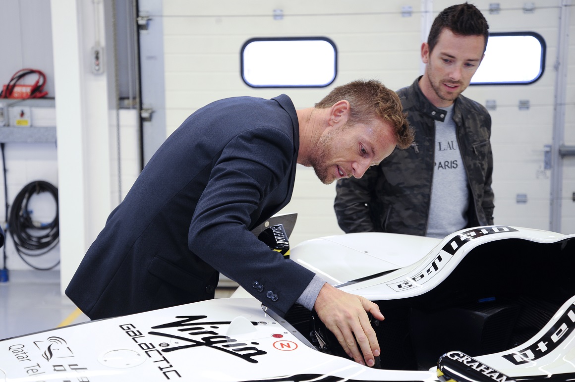 Jenson Button inspecting his 2009 World Championship qinning car which was on display throughout the morning